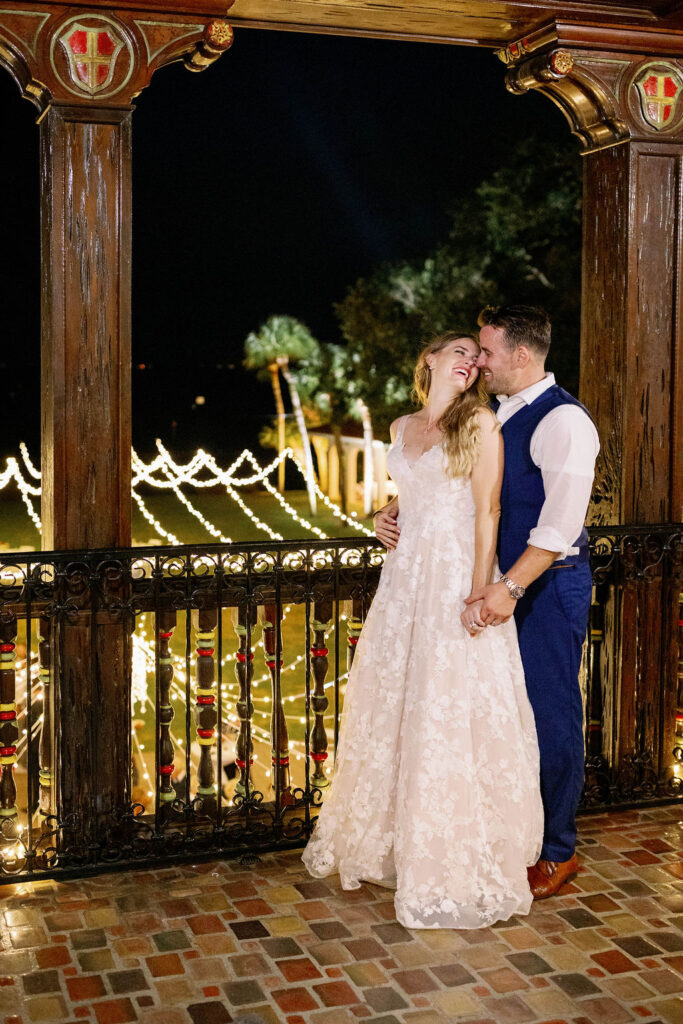 bride and groom on balcony at Powel Crosley Estate