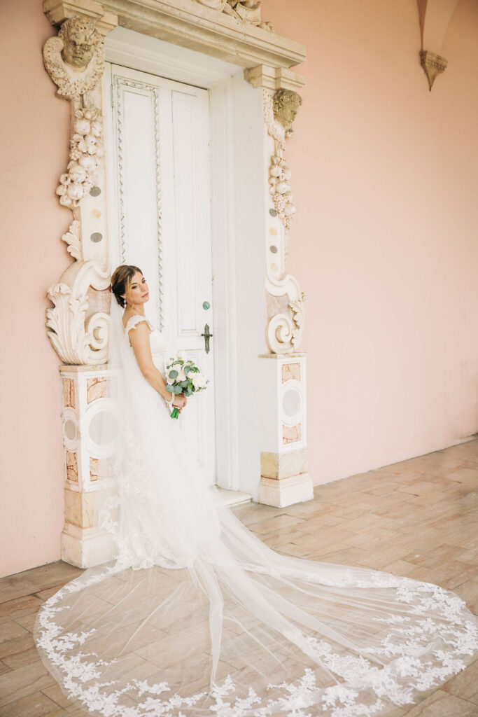 bride with lace lined cathedral train