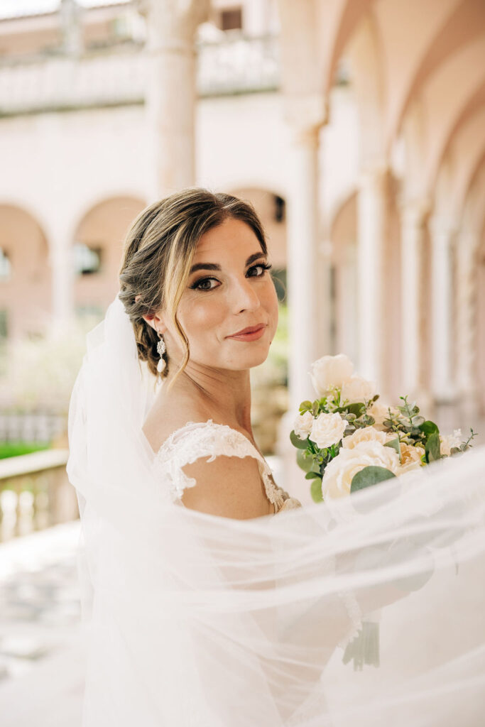 bride with classic wedding updo and wedding makeup