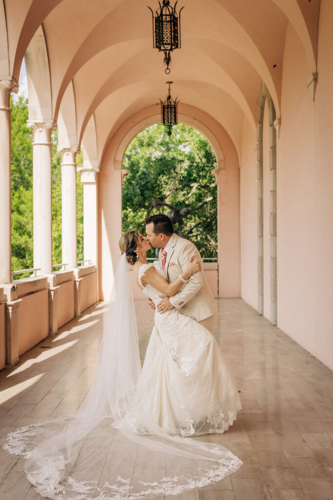 bride and groom at their Ringling Courtyard wedding