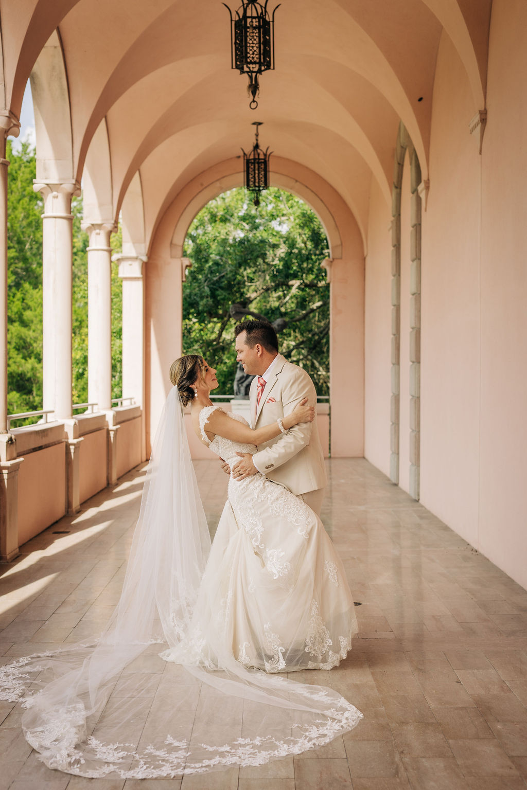 bride and groom portraits in Ringling Courtyard