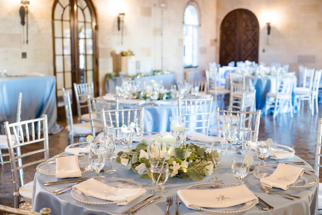 white and blue wedding reception centerpieces