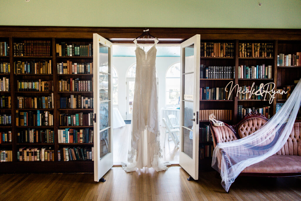 wedding gown hung up in Edson Keith Mansion library