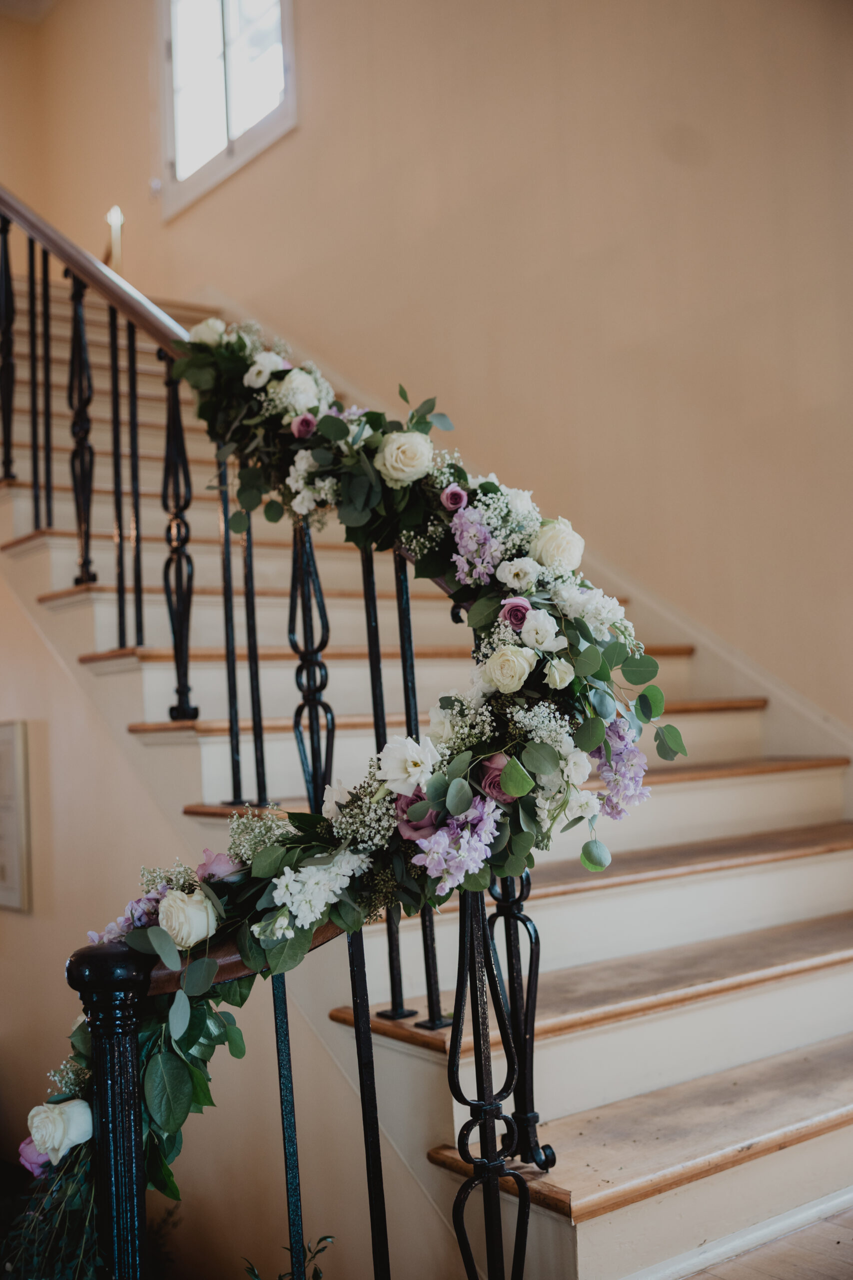 colorful florals for staircase at Edson Keith Mansion