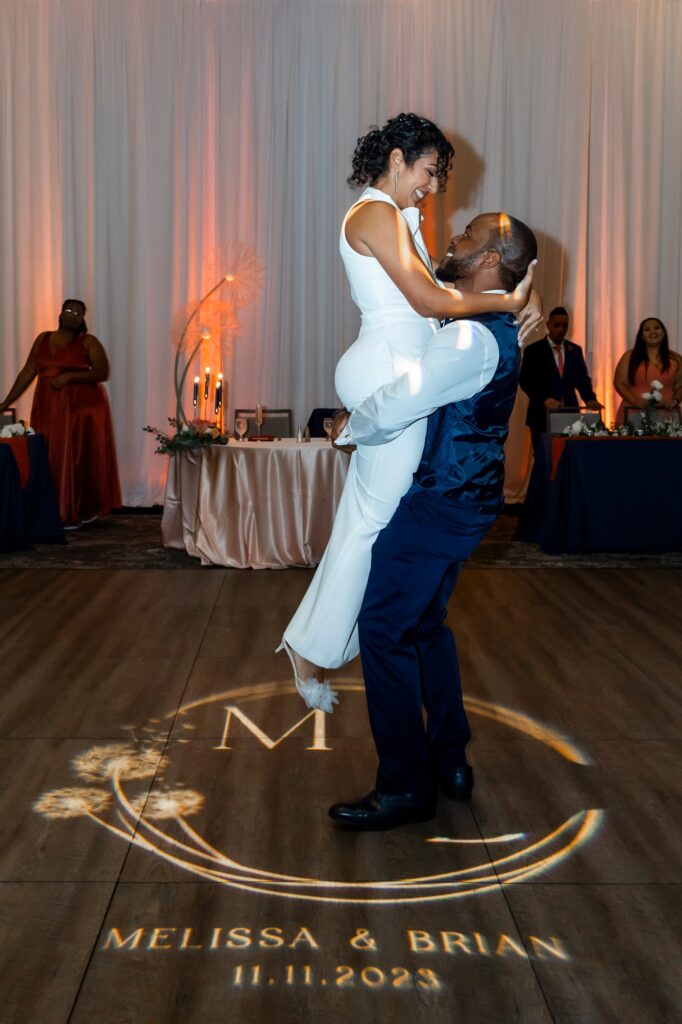 bride and groom dancing at their wedding at Grove, planned by Precious Moments Events