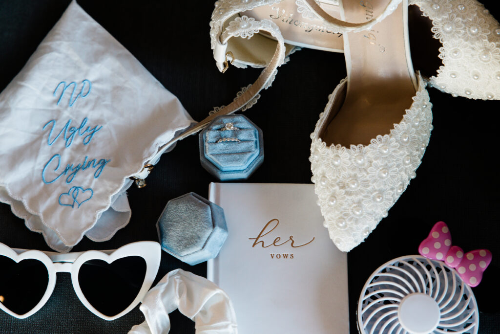 bridal accessories flatlay with white an blue details