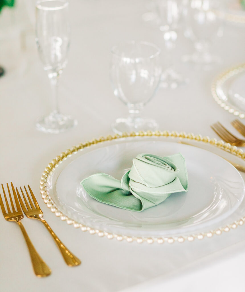 elegant wedding tablescape with green details by Precious Moments Events