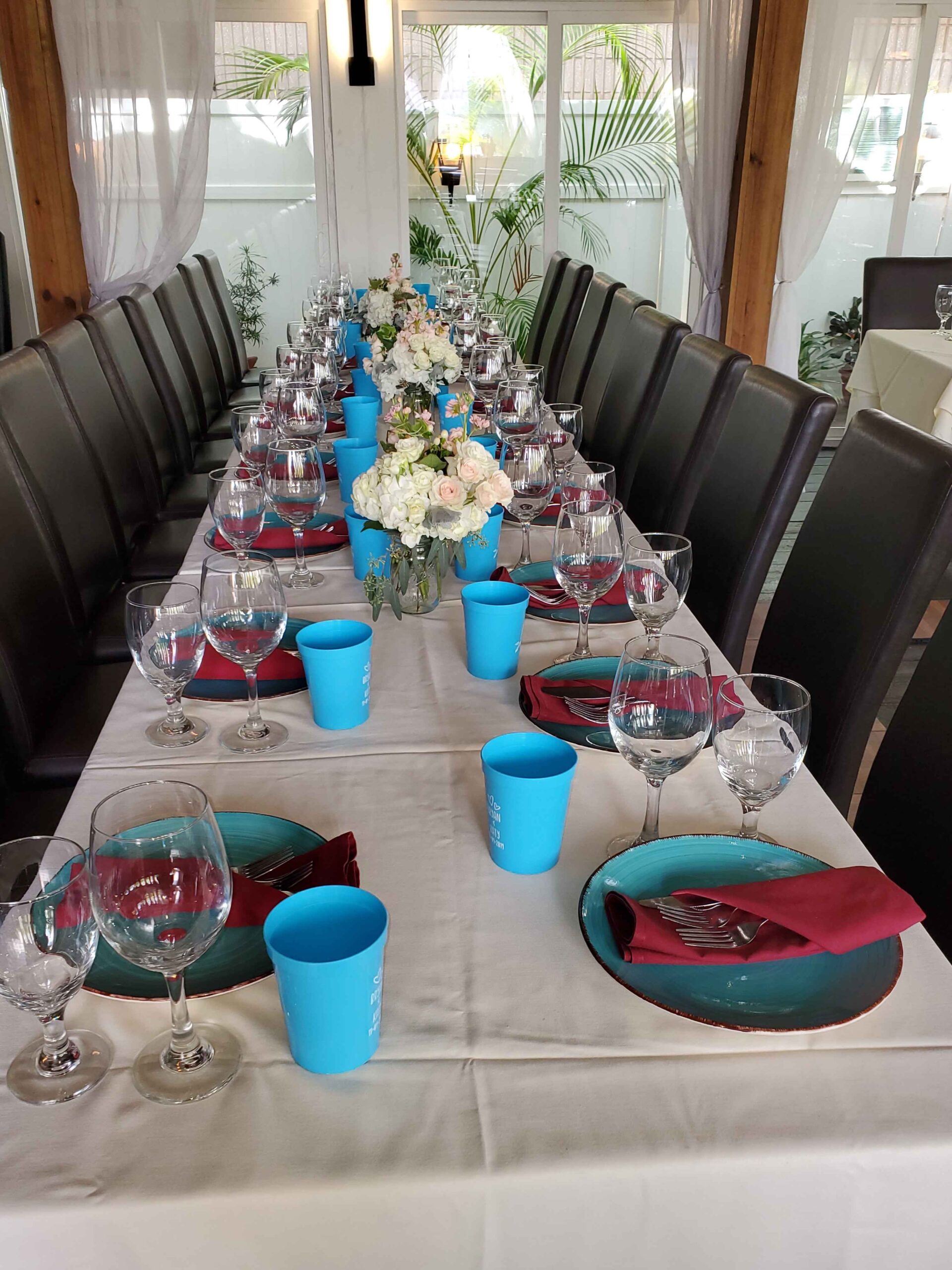 blue and red wedding tablescape at Cafe Gabbiano by Precious Moments Events