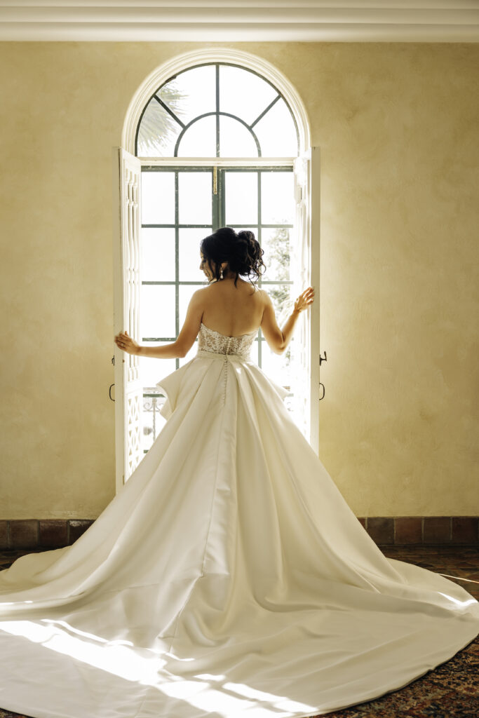 back photo of a bride in an elegant gown at Powel Crosley Estate