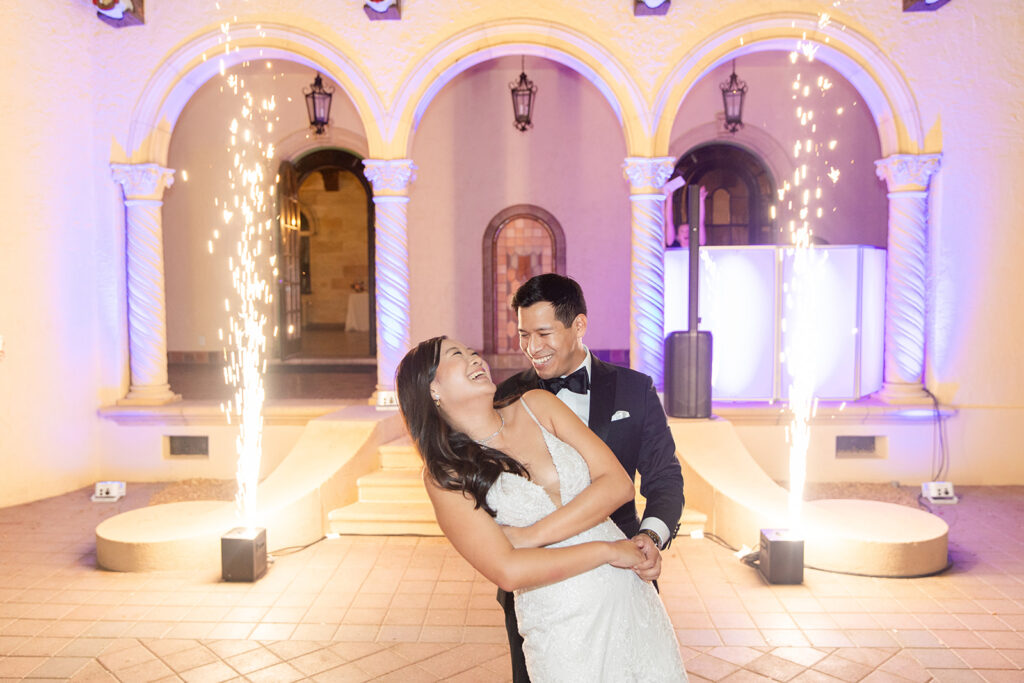 bride and groom with sparklers