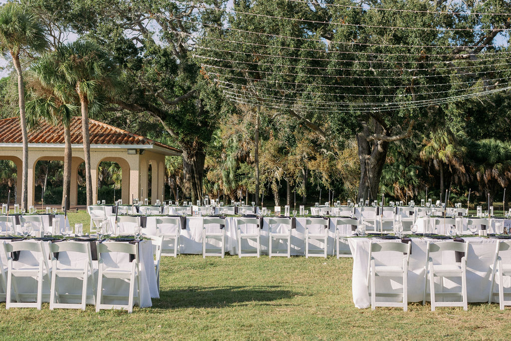 outdoor wedding reception with stringed lights